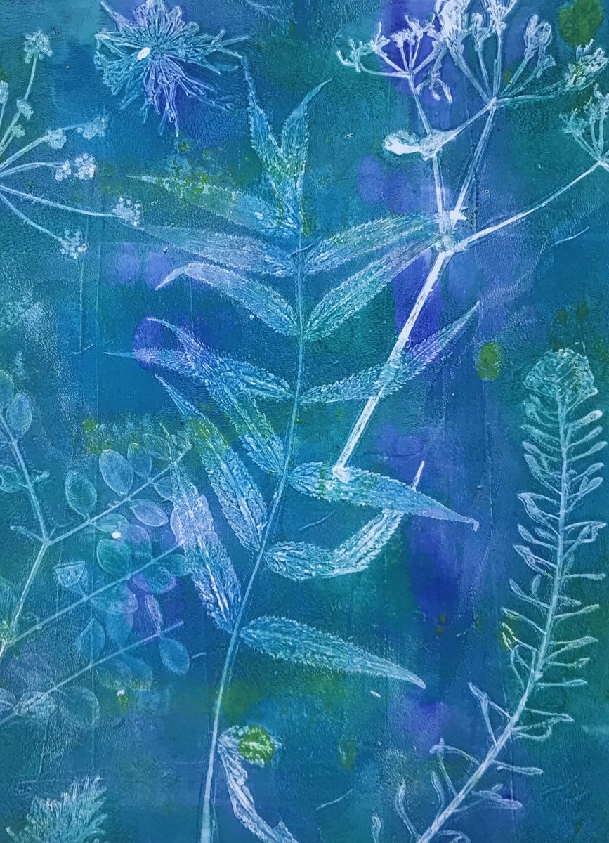 Leaves and grasses on a blue background 