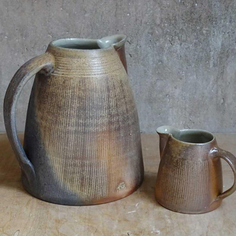  Large and small conical shaped Jugs