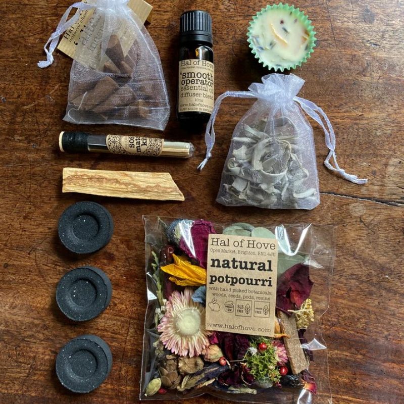 Selection of artisan home fragrance items including potpourri, burner oil, candles and natural incense