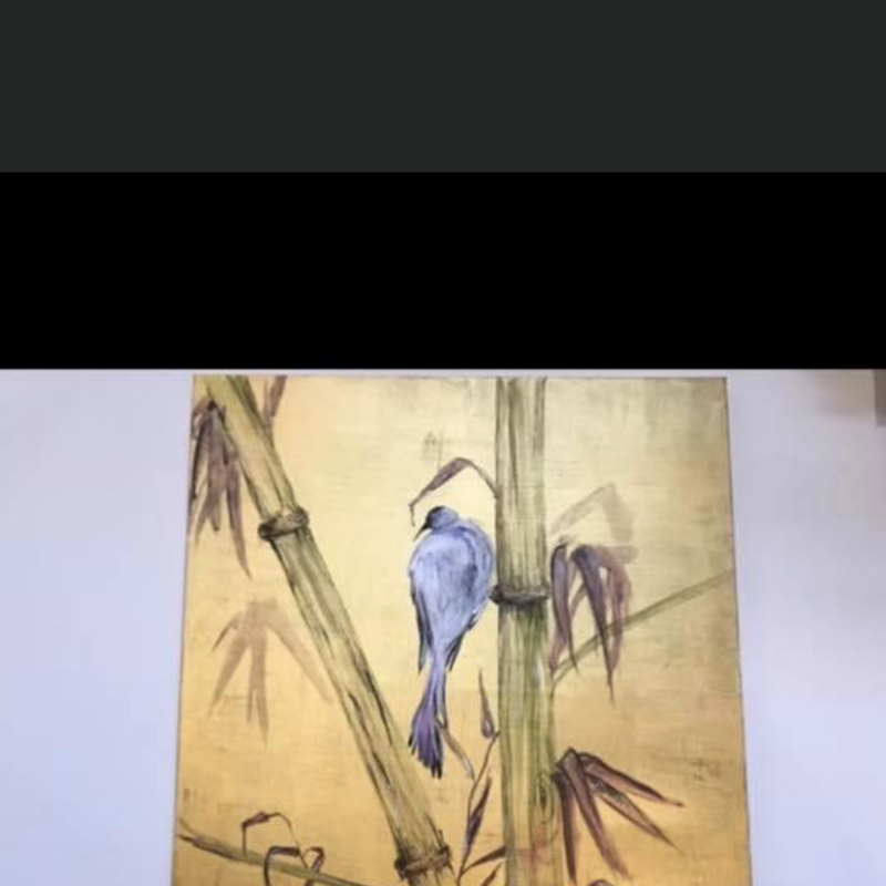 Bird in bamboo on a gold background