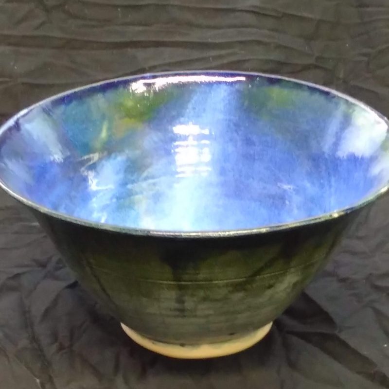 Large tall blue bowl iron flecked stoneware, blue glaze on green slip.