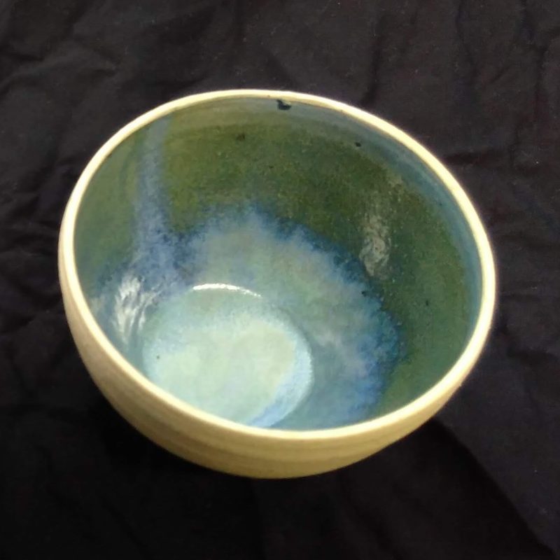 Small bowl. Stoneware blue glaze inside, unglazed outside
