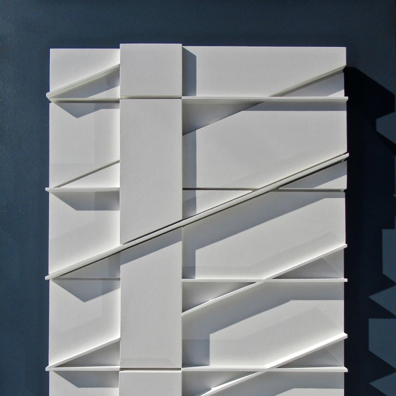 white relief with raised diagonal elements