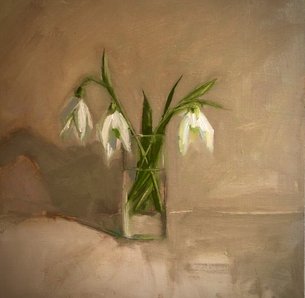 A square 10 by 10 inch oil painting. In the centre of the square is a   small glass jar with 3 snowdrops hanging over the edge. The snowdrops are white with green leaves and there is a neutral  brown background. 