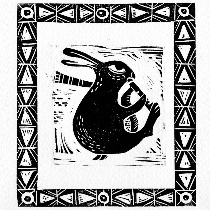 Black and white lino cut of a hare playing bagpipes 
