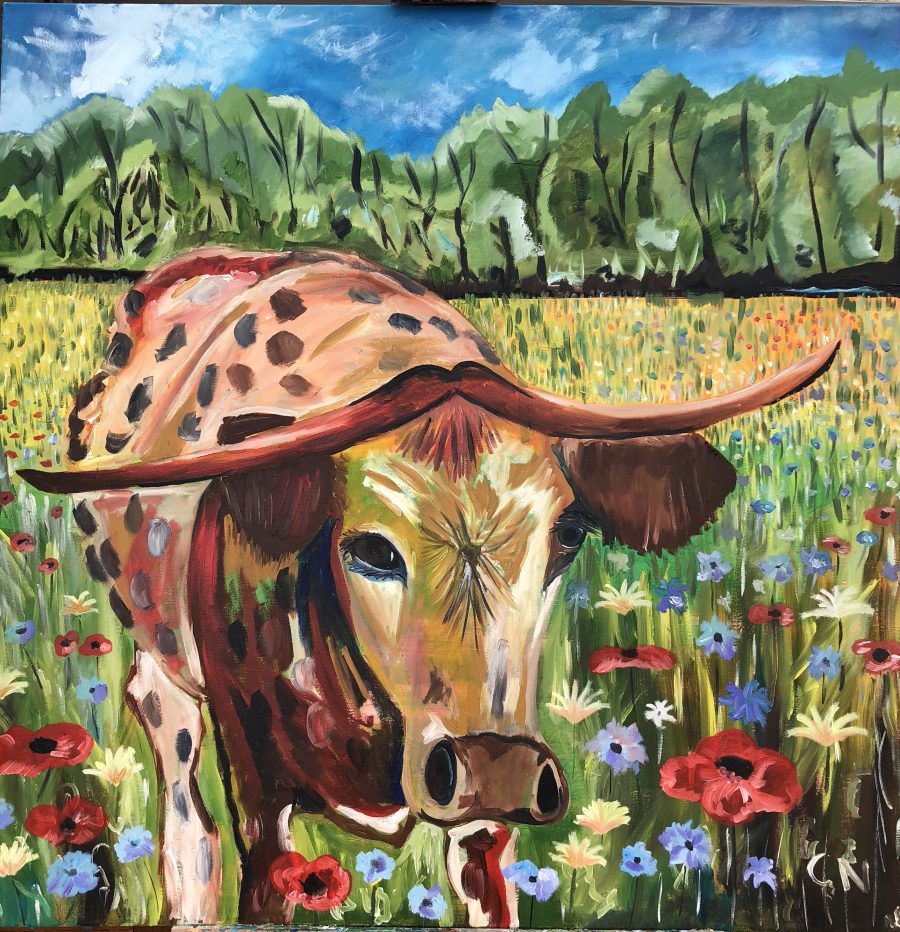 A vibrant, colourful longhorn cow painted in a summer meadow with wild flowers. Poppies, cornflowers, daisies.