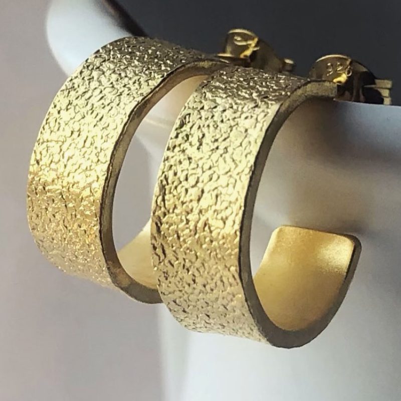 Handcrafted organically textured wide gold hoop earrings. 