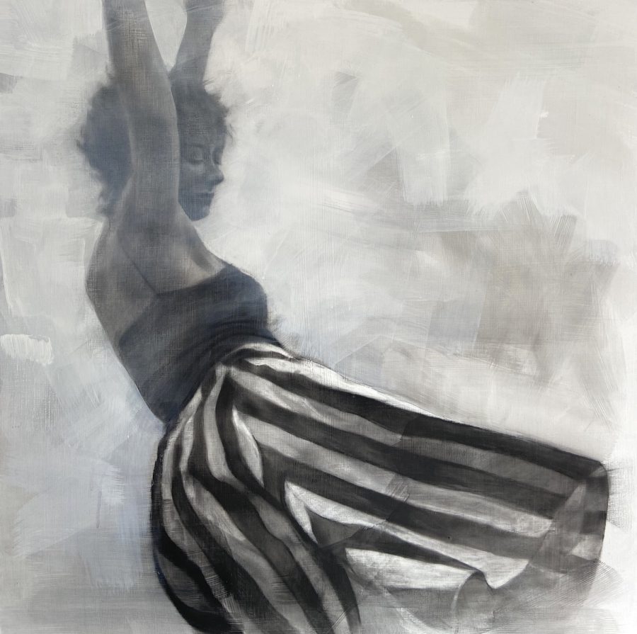 Girl in black and white striped skirt dances 