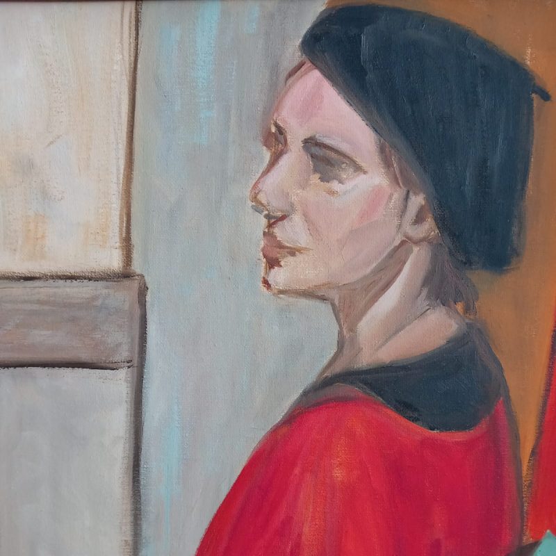 Portrait of a woman in Red with a black beret.