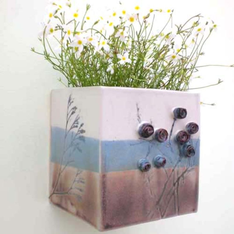Blue stripe wall planter with roses by Kathy Laird
