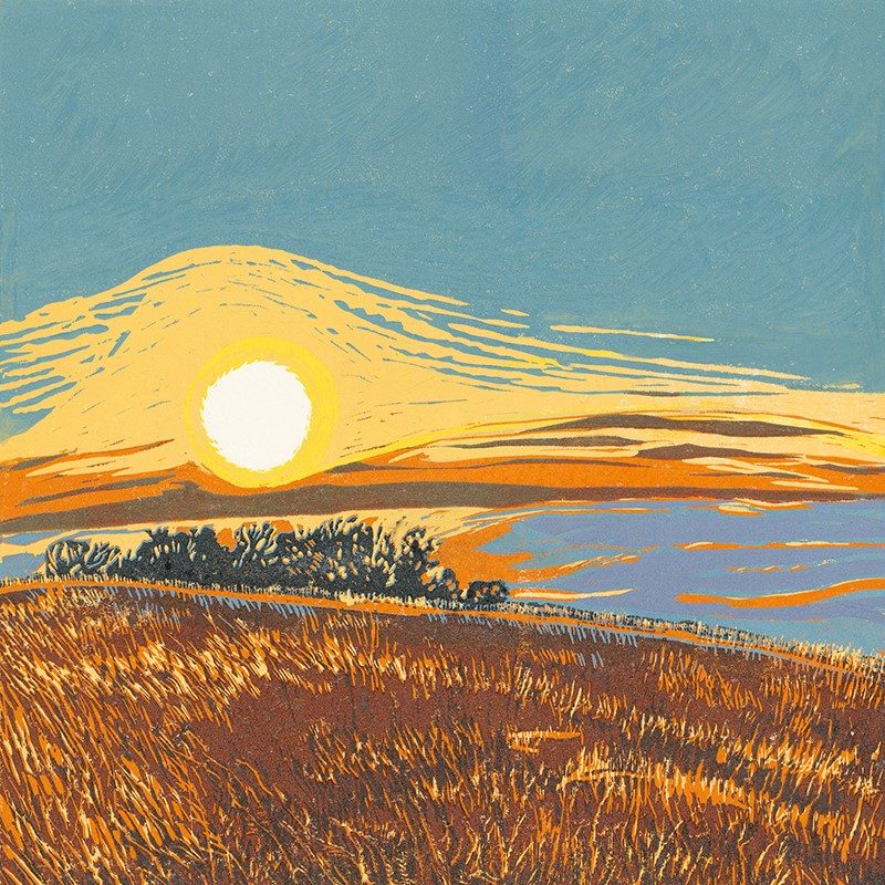 A reduction lino print of the sun rising over Plumpton plain.