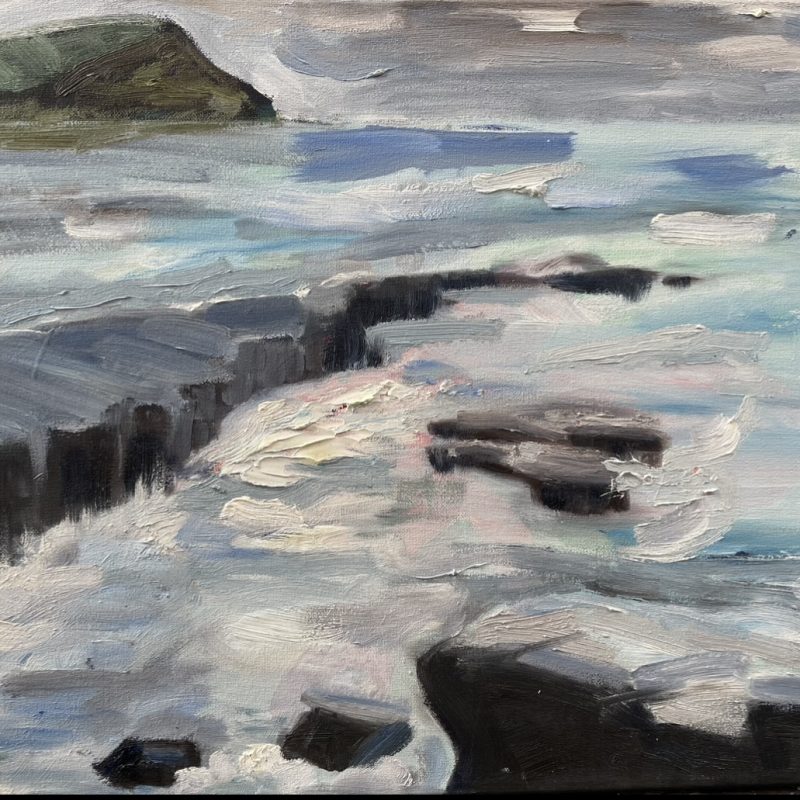 A textured seascape with rocks. the brush strokes give a dramatic life and mood to the sea. There are different hues of blue, turquoise, cream and very pale pink. 
