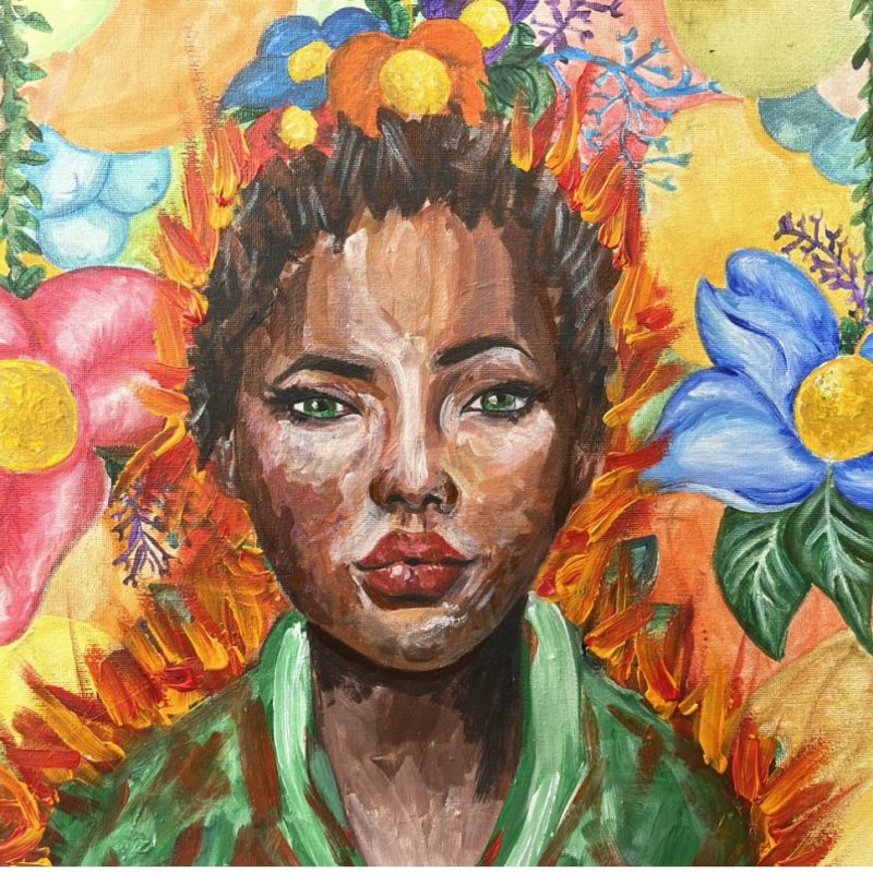 A portrait painting of a woman with hair scraped back from her face. She is surrounded by colourful flowers, and the background colour yellow. She has lots of brown flesh tones building the shape and form of her face. She has green eyes which pick out her green top.  