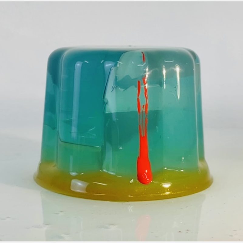 Jelly with suspended razor blade and blood