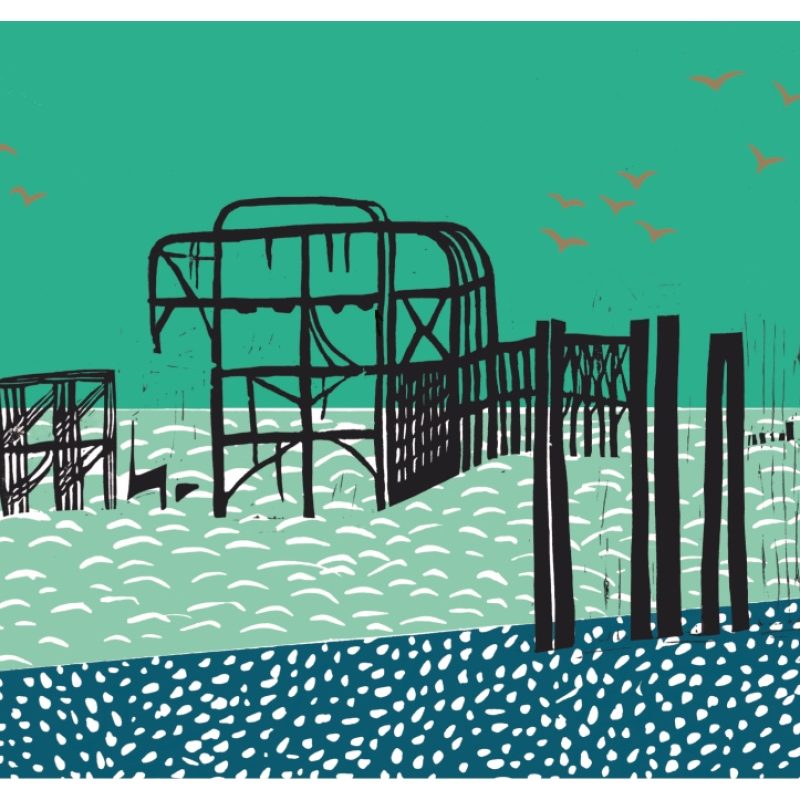 Black lines of the west pier as it breaks down over the sea. Green turquoise sky and sea with seagulls and darker turquoise beach in the foreground