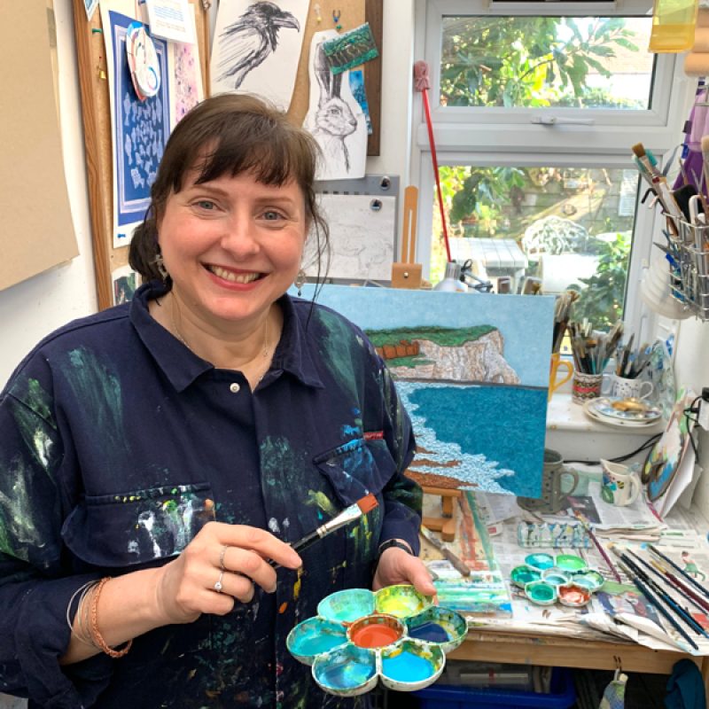Resident Artist painting in her Brighton studio