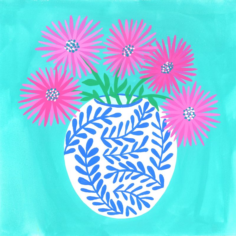 Pink flowers in blue and white vase