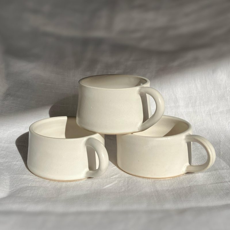 Small, shallow matte white espresso mugs 