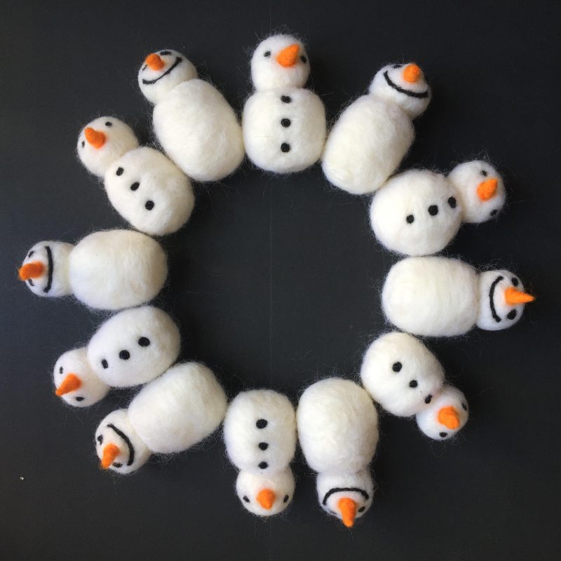 Circle of needle felted snowmen
