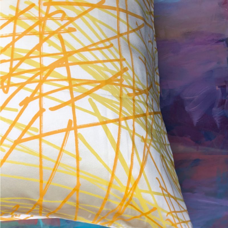 Handprinted Lemon yellow silk satin pillowcase with multi directional design.