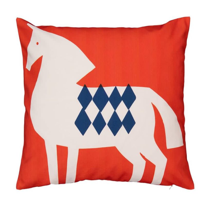 A cushion with a graphic image of a horse printed on it