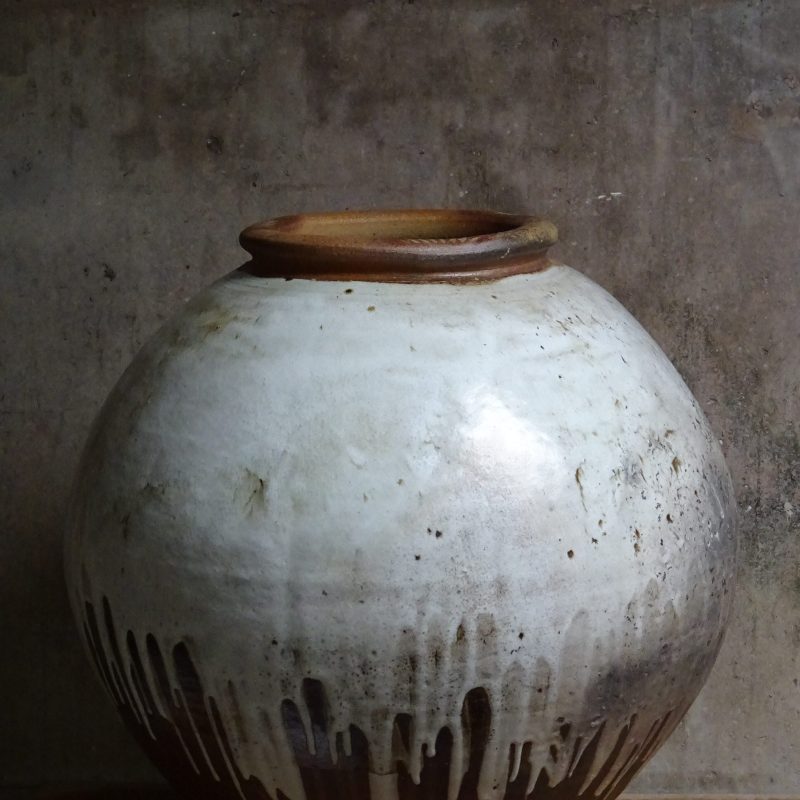Large pot with dripping glaze