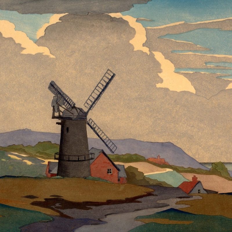 Image features a mill in Sussex landscape with cloudy sky