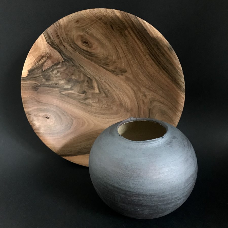 Walnut bowl with stoneware spherical vessel