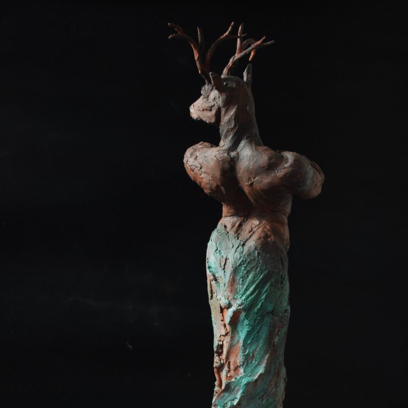 Bronze sculpture of a stag-man