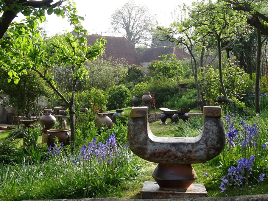 Garden featuring pots and ceramic seats