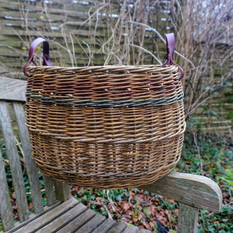 Hand woven oval, log or blanket basket made with Old French brown, Dickie Meadows and Flanders Red Somerset grown Willow, with leather handles.