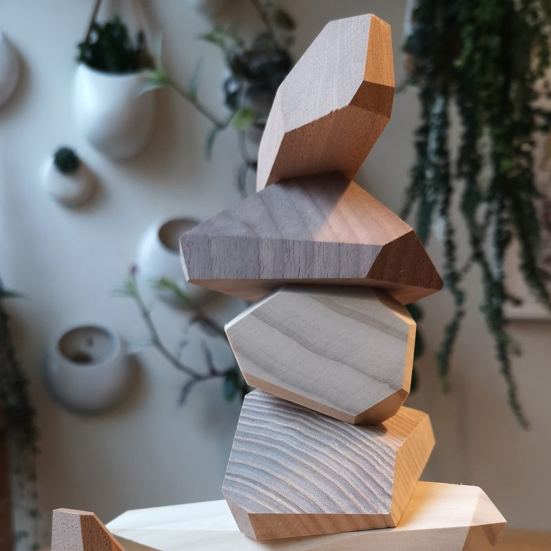 Stack of geometric turned wooden blocks