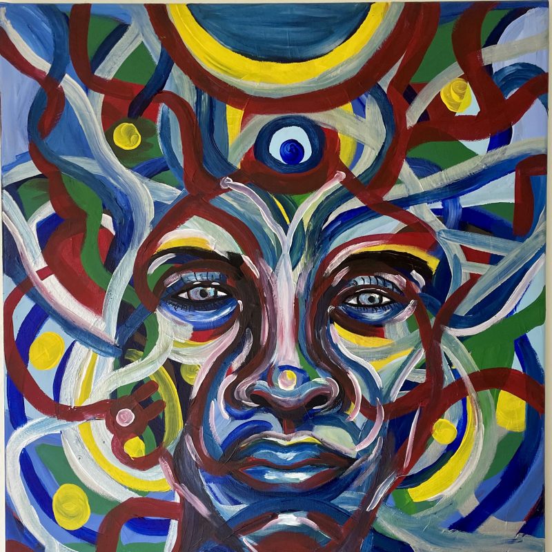 A dynamic and vibrant portrait piece. The form is totally intertwined with the abstract patterns that make up the background. It's is composed of blue, silver, red green and yellow. If you look closely you will also notice a hint of the form of a butterfly around the face.