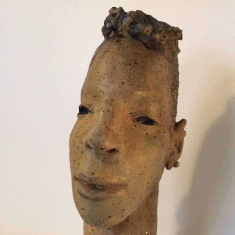 Ceramic head of young man