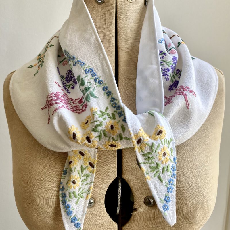 Linen scarf with embroidery detailing