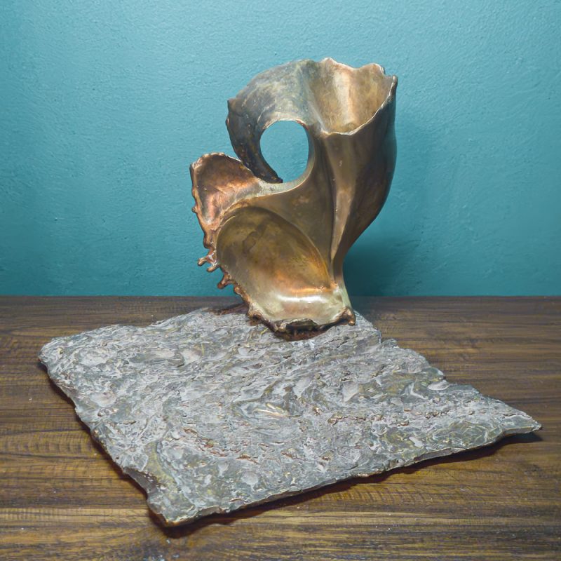 astract wave/shell form of rippled base