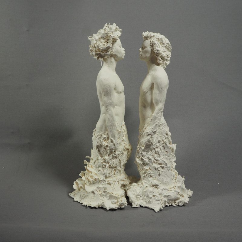 White ceramic pair of male figures,  interacting