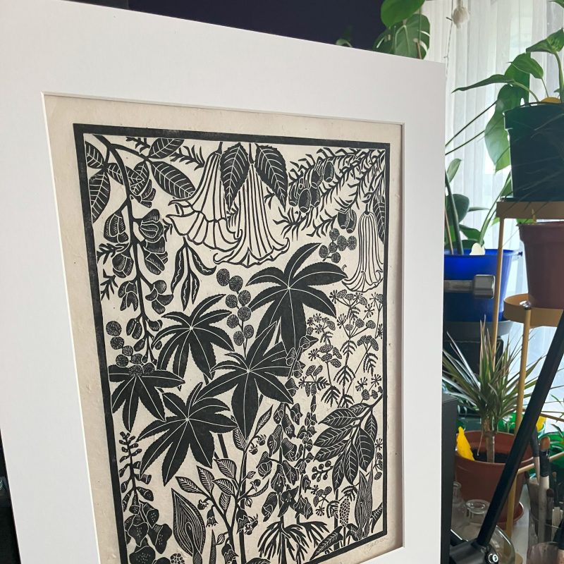 A hand printed image of poisonous plants including Castor Oil Plant, Deadly Nightshade, Foxglove and Yew. The print is in black ink on a neutral coloured textured paper