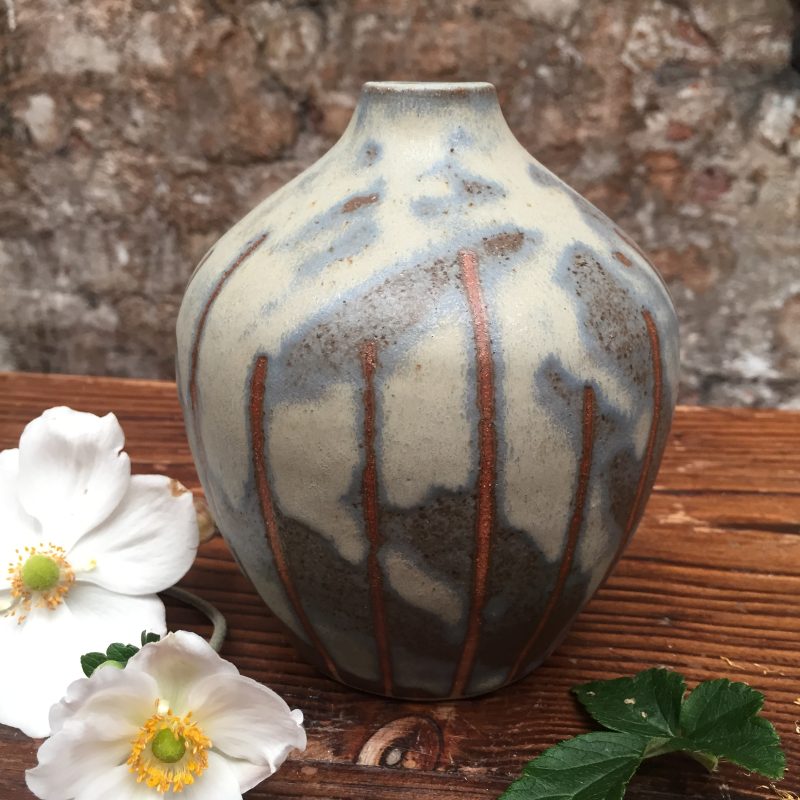 Small round ceramic bottle with neck, suitable as a bud vase, glazed in shades of soft grey with vertical russet lines