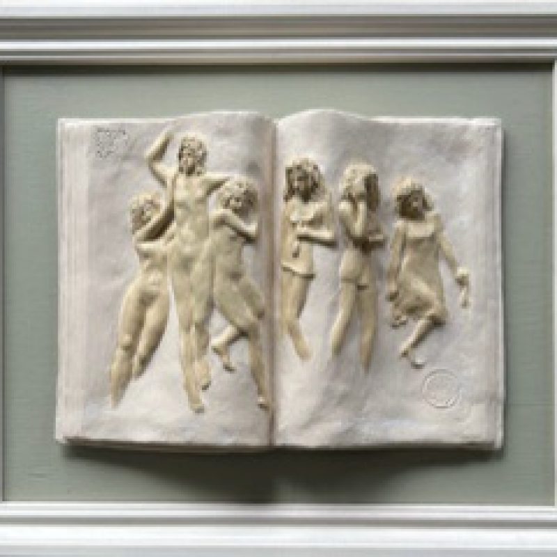 Figures in bas relief on green background