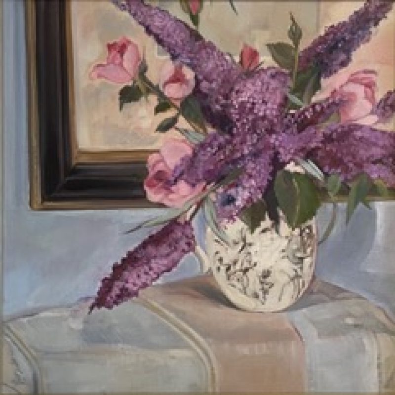 A vase before a floral painting. In vase roses and buddleia. 