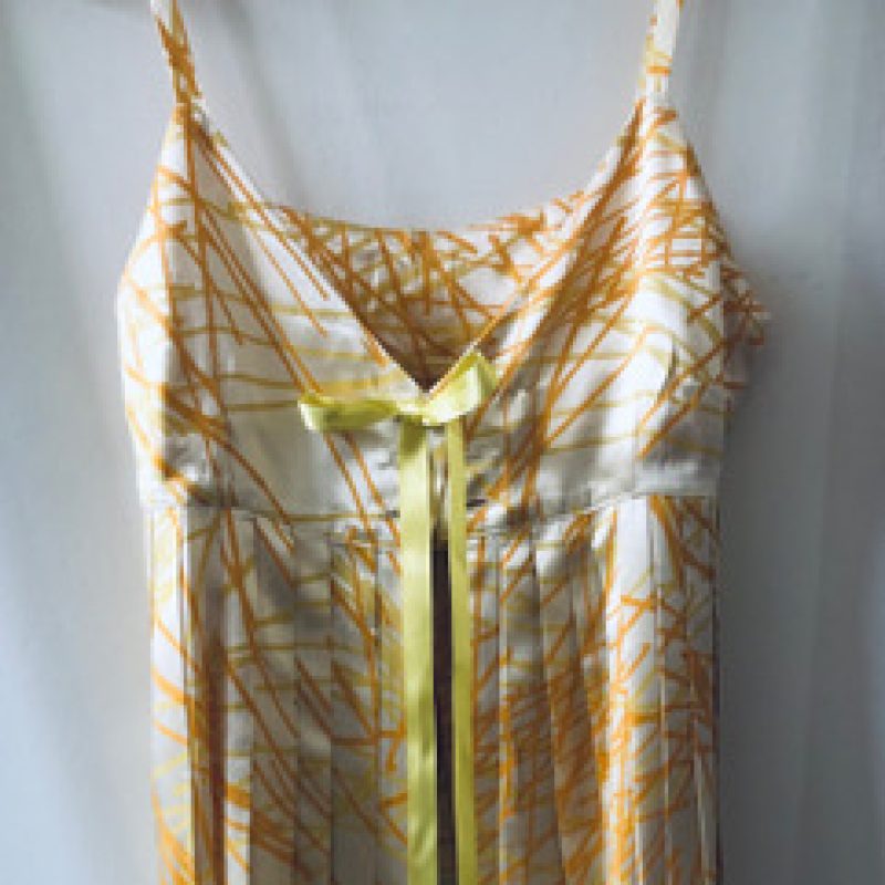Crepe silk yellow camisole linear crosshatched design in orange and lemon.