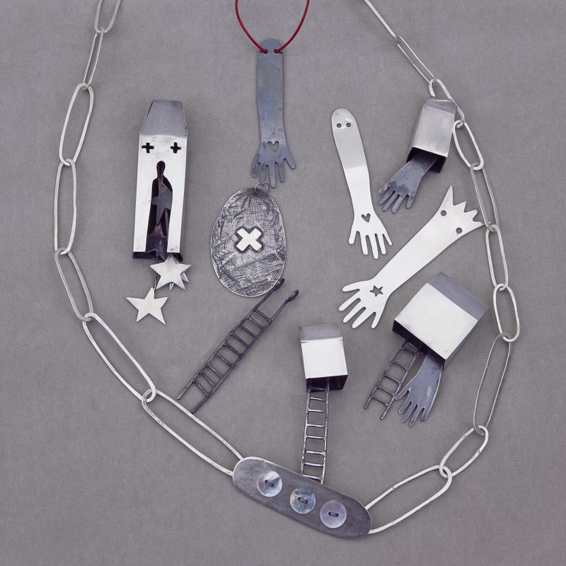 Collection of narrative jewellery pieces