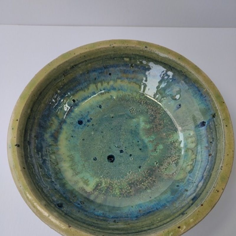 Glazed stoneware dish - a blend of greens and blues and ochre