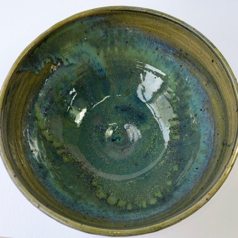Medium stoneware glazed bowl in greens and ochre