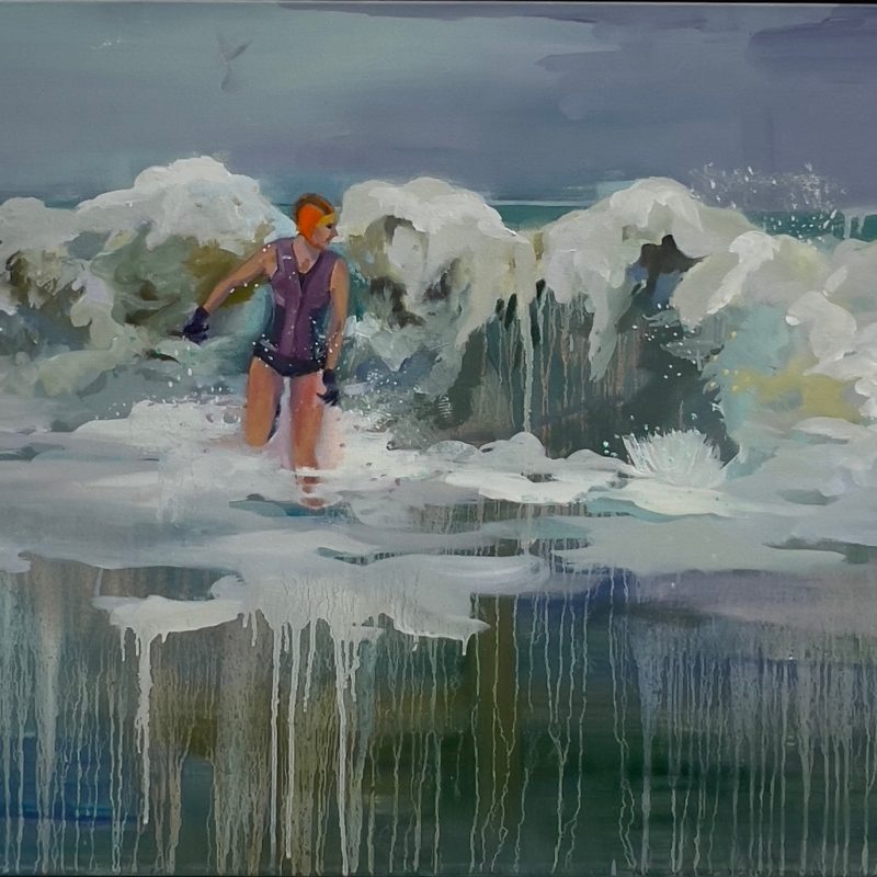 An experienced swimmer runs out of the sea with the waves high behind her. Oil on canvas in lilacs and greens. 