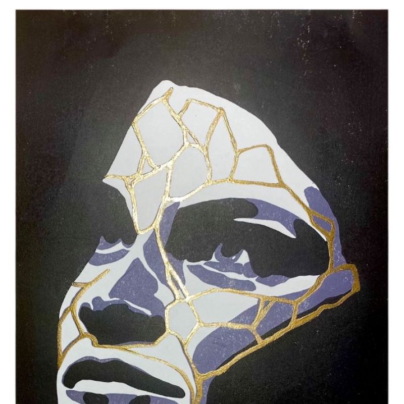 An image of a face, repaired through the art of Kintsugi