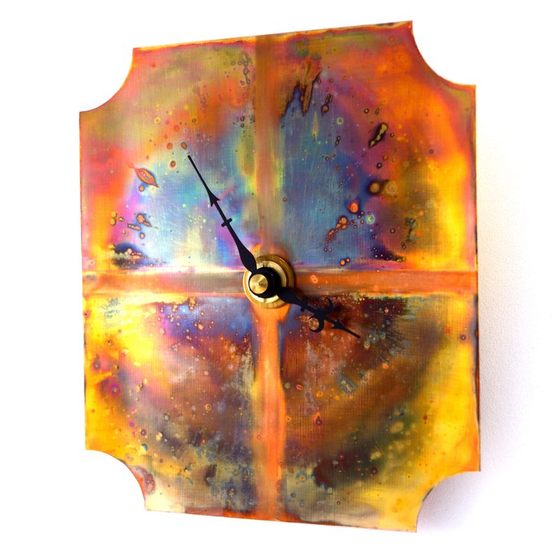 Copper wall clock in vibrant colours