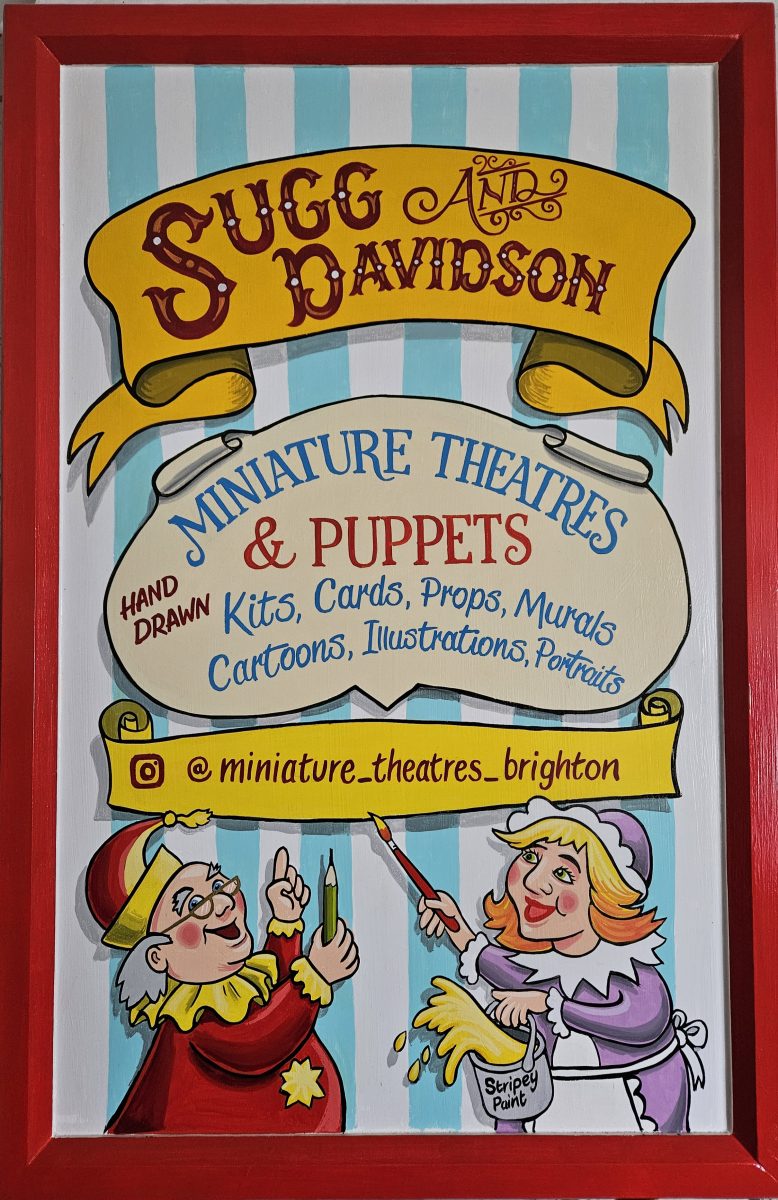 Shop sign with the artists looking like Punch and Judy