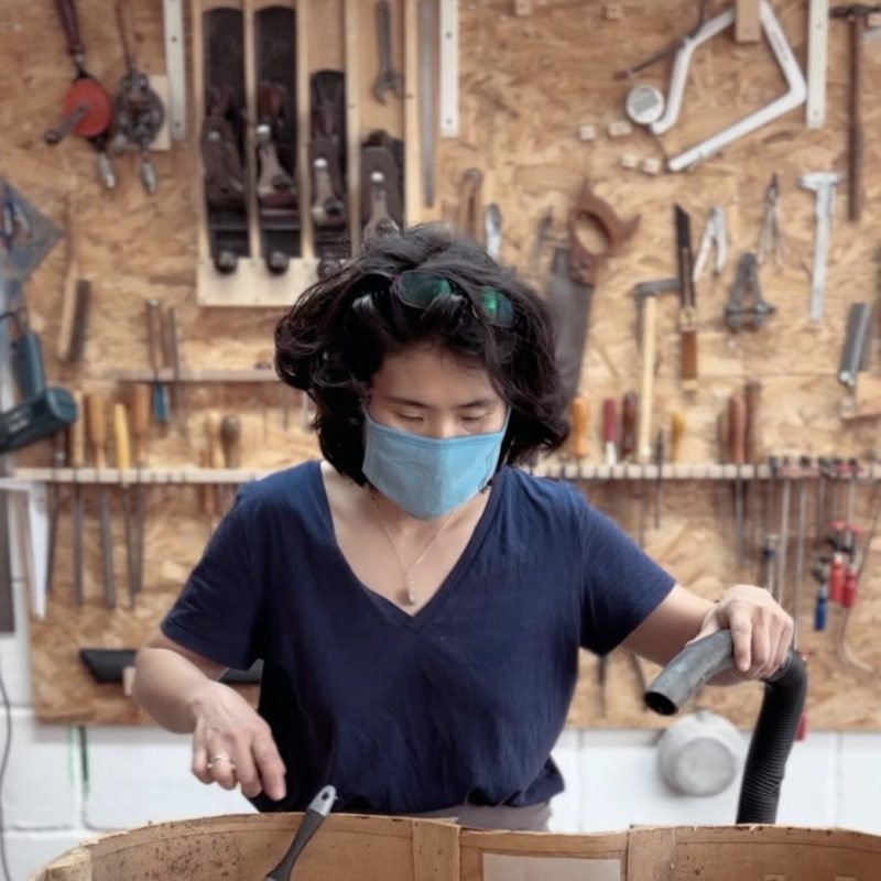 Eunju Lee, Stringed Instrument Maker, in her workshop